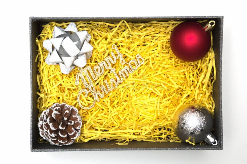 Texte de Joyeux Noël et ruban, boule, cône de pin en cadeau noir b photo libre de droits Texte de Joyeux Noël et ruban, boule, cône de pin en cadeau noir b photo libre de droits