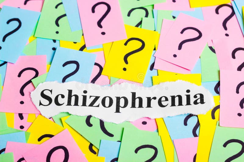 Texte de syndrome de schizophrénie sur les notes collantes colorées dans la perspective des points d'interrogation images libres de droits Texte de syndrome de schizophrénie sur les notes collantes colorées dans la perspective des points d'interrogation images libres de droits