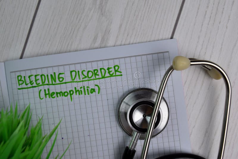 Bleeding Disorder Hemophilia text write on a book isolated on office desk. Healthcare/Medical concept. Bleeding Disorder Hemophilia text write on a book isolated on office desk. Healthcare/Medical concept