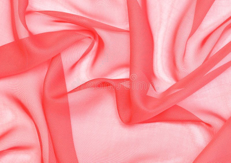 Textile. Abstract soft red chiffon texture background. Macro with extremely shallow dof.