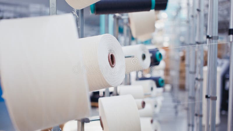Row Of Automated Machines For Yarn Manufacturing. Modern Textile Plant.  Textile Manufacturing Of Synthetic Fibers. Stock Photo, Picture and Royalty  Free Image. Image 51246219.