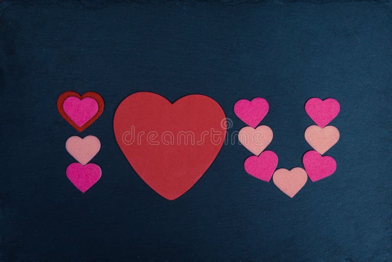 Texto abreviado te amo con forma del corazón en la pizarra foto de archivo Texto abreviado te amo con forma del corazón en la pizarra foto de archivo