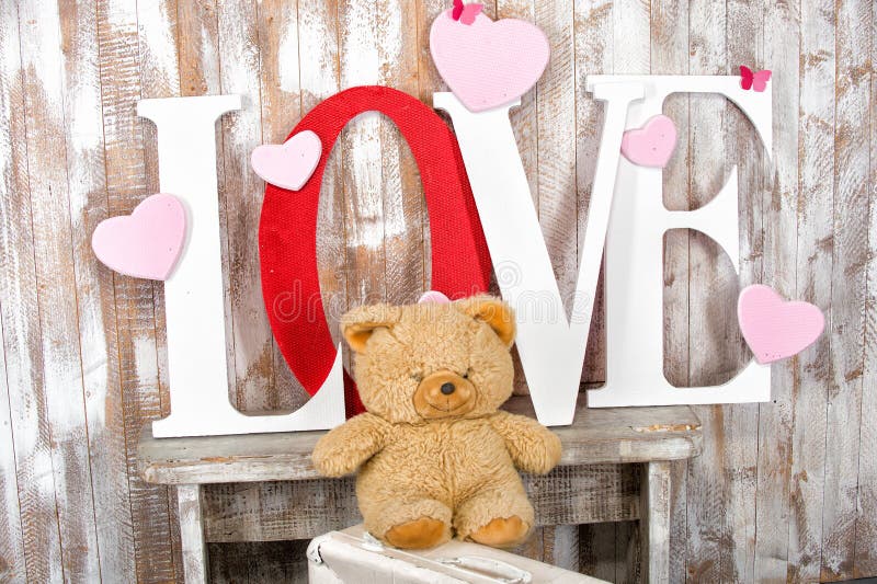 Texto del amor con los corazones y la mariposa del oso imagenes de archivo Texto del amor con los corazones y la mariposa del oso imagenes de archivo