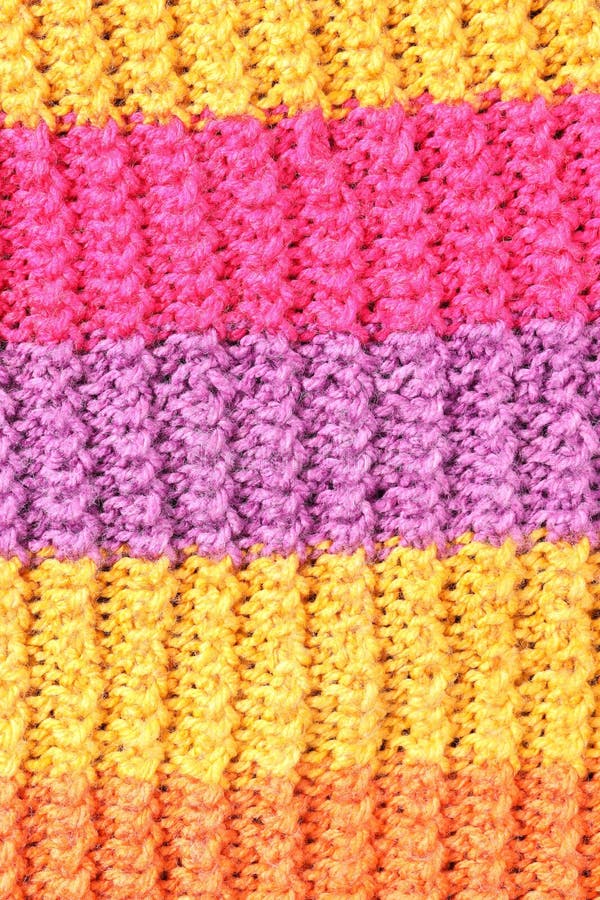 Textur aus buntem Strickstoff als Hintergrund lizenzfreies stockfoto