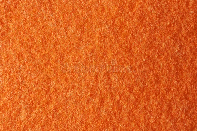 Textur av orange filt som bakgrund arkivbilder Textur av orange filt som bakgrund arkivbilder
