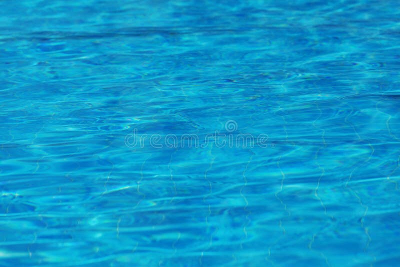 Textura abstracta del fondo de la superficie del agua azul imagen de archivo Textura abstracta del fondo de la superficie del agua azul imagen de archivo