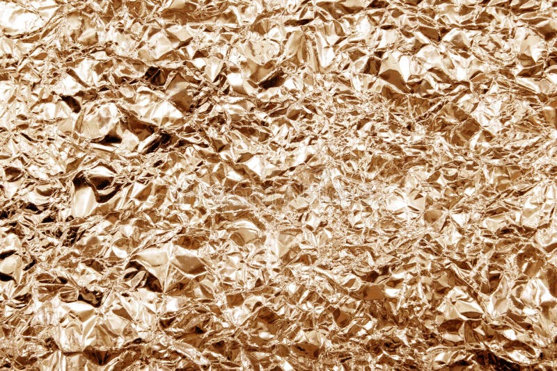 Textura abstracta marrón arrugada del fondo de la hoja de oro Hoja marrón brillante para el fondo de la textura de la Navidad fotos de archivo Textura abstracta marrón arrugada del fondo de la hoja de oro Hoja marrón brillante para el fondo de la textura de la Navidad fotos de archivo