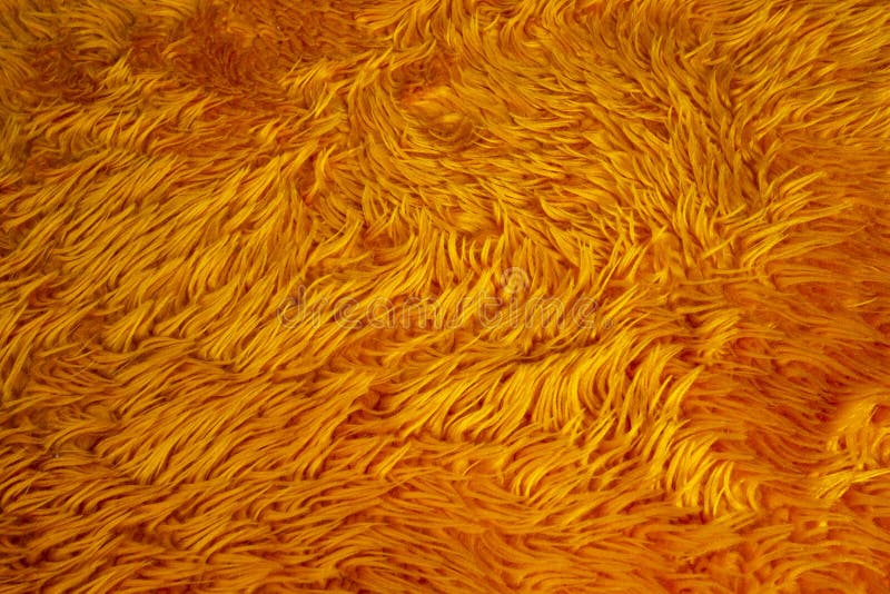 Textura anaranjada del fondo de la piel, colorido mullido de las lanas de la naturaleza fotos de archivo libres de regalías Textura anaranjada del fondo de la piel, colorido mullido de las lanas de la naturaleza fotos de archivo libres de regalías