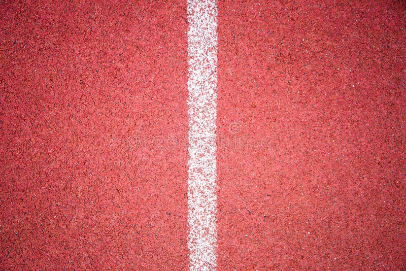 Textura corriente de la pista del atletismo fotos de archivo libres de regalías Textura corriente de la pista del atletismo fotos de archivo libres de regalías