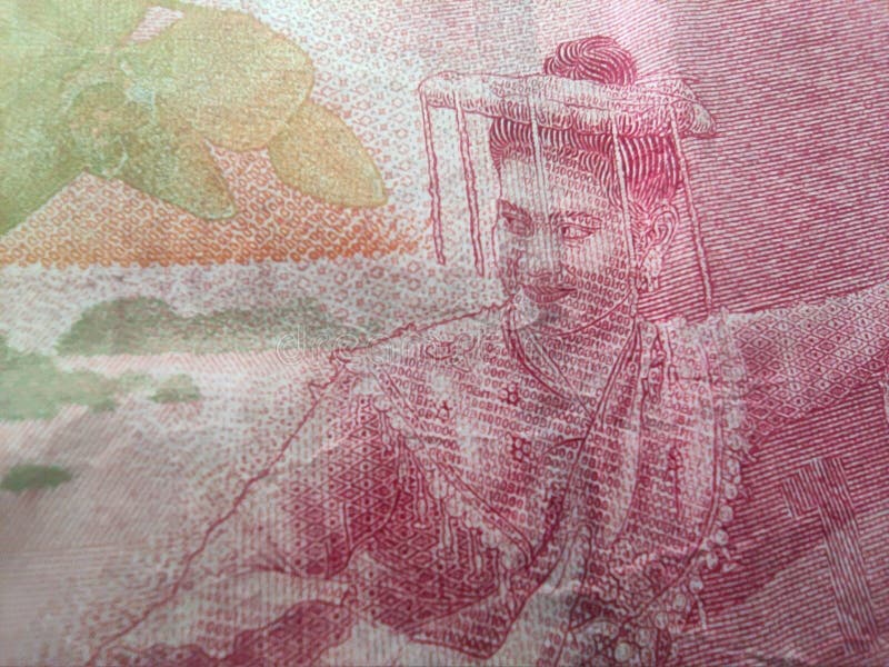 Textura de moeda indonésia com motivo de mulher dançante tradicional imagem de stock