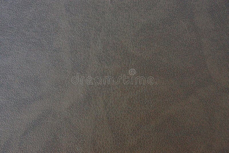 Textura de Brown de uma parte de couro fotos de stock royalty free Textura de Brown de uma parte de couro fotos de stock royalty free