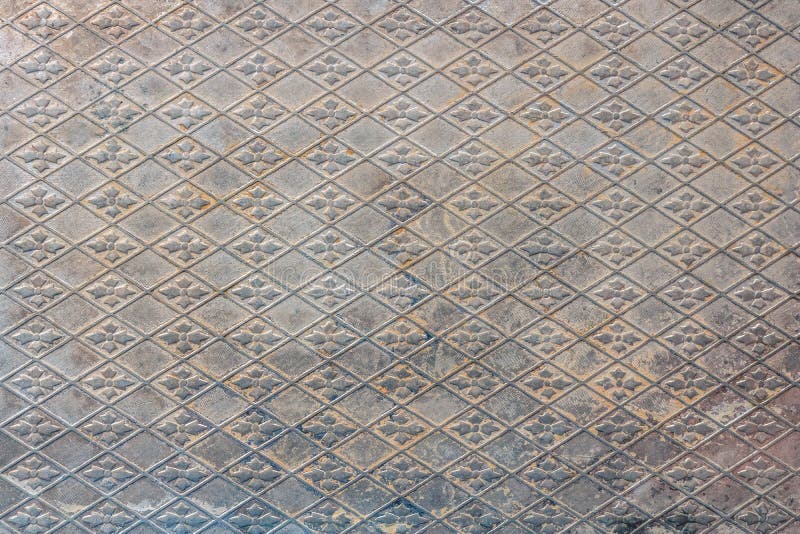 Textura de la hoja de metal Repetición del modelo en una superficie de metal imagen de archivo libre de regalías Textura de la hoja de metal Repetición del modelo en una superficie de metal imagen de archivo libre de regalías