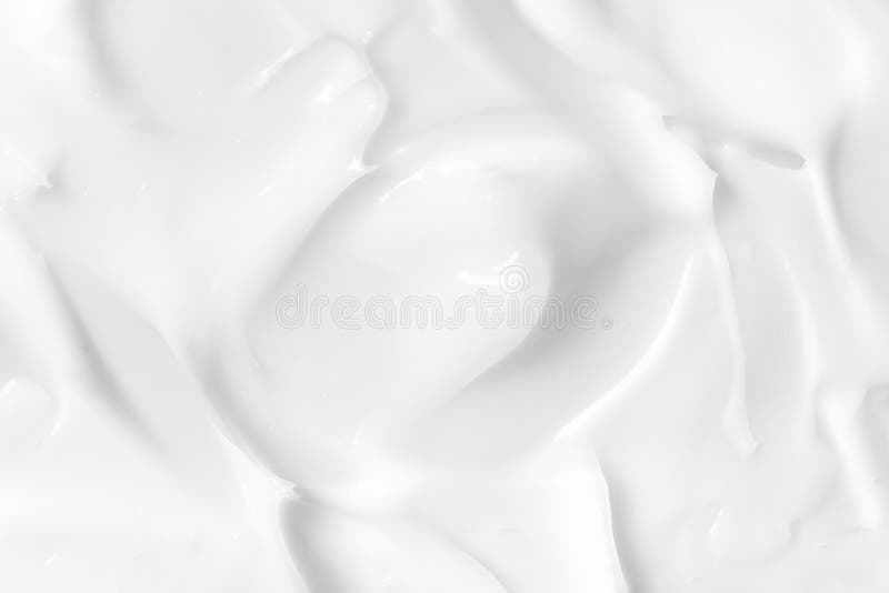 Textura de la loción Fondo blanco de la crema del cuidado de piel Mancha cremosa cosmética