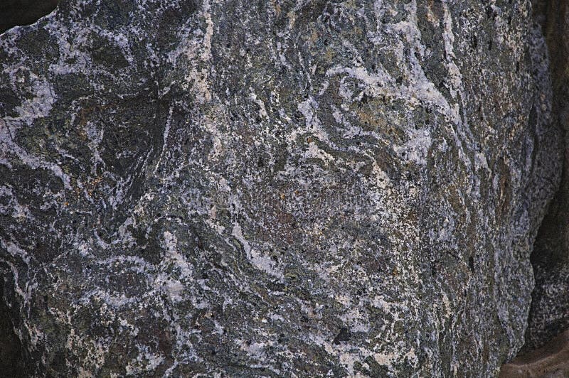 Textura de la piedra natural Fondo Textured Gris, verde, blanco y púrpura fotografía de archivo Textura de la piedra natural Fondo Textured Gris, verde, blanco y púrpura fotografía de archivo