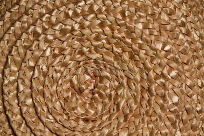 Textura de mimbre de la armadura de la trenza de la cesta, fondo de la macro de la paja del círculo