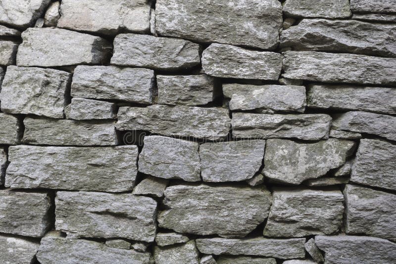 velho muro de pedra natural 1244893 Foto de stock no Vecteezy