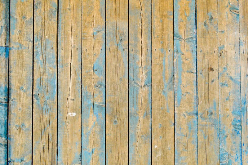A textura de pranchas de madeira naturais com as emendas pintadas com pintura de descascamento azul de gasto velho riscado rachou fotos de stock A textura de pranchas de madeira naturais com as emendas pintadas com pintura de descascamento azul de gasto velho riscado rachou fotos de stock