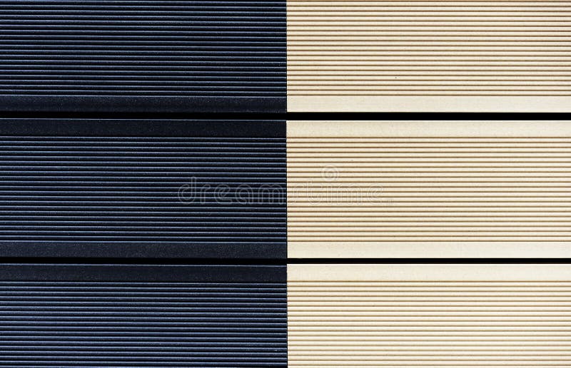 Textura de tableros colgantes beige y negros Fondo del decking fotografía de archivo Textura de tableros colgantes beige y negros Fondo del decking fotografía de archivo