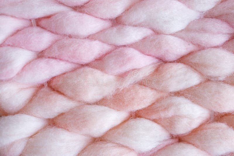 Textura de um cobertor de malha cor-de-rosa Tricô grande Lã de merino Vista superior imagens de stock Textura de um cobertor de malha cor-de-rosa Tricô grande Lã de merino Vista superior imagens de stock