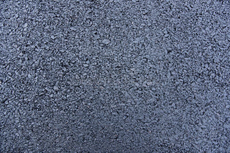 Textura de uma estrada asfaltada fotografia de stock Textura de uma estrada asfaltada fotografia de stock