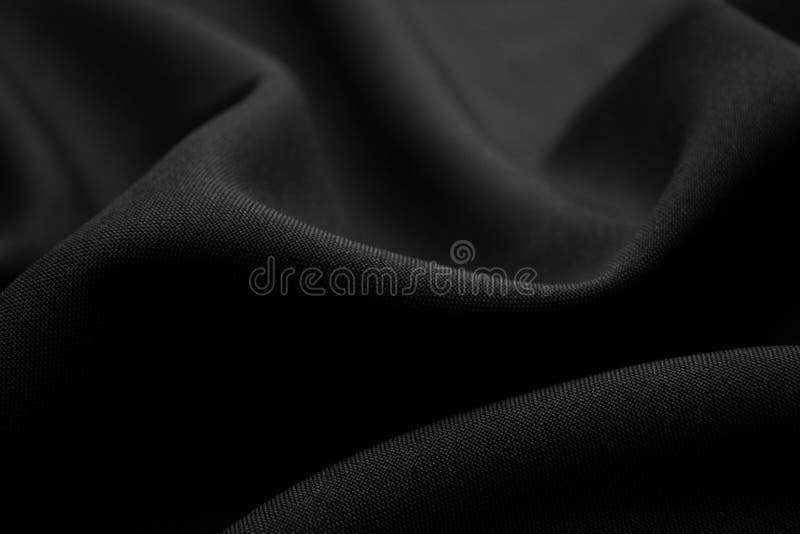 Textura de tela negra en ondas