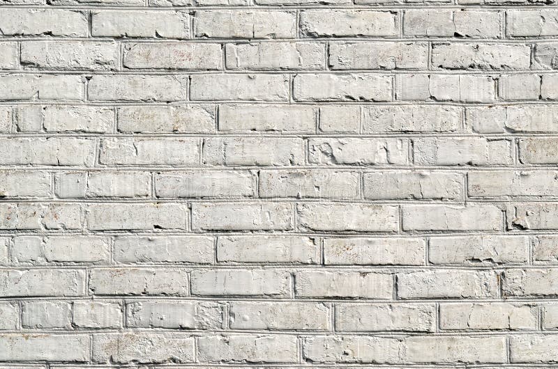 Textura del ladrillo viejo, pintada en blanco foto de archivo libre de regalías Textura del ladrillo viejo, pintada en blanco foto de archivo libre de regalías