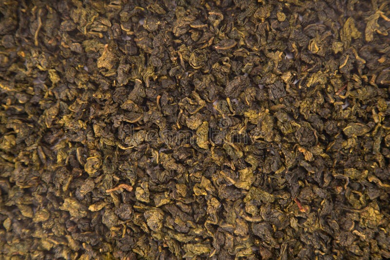 Textura del té de Guan Yin Oolong del lazo imágenes de archivo libres de regalías Textura del té de Guan Yin Oolong del lazo imágenes de archivo libres de regalías