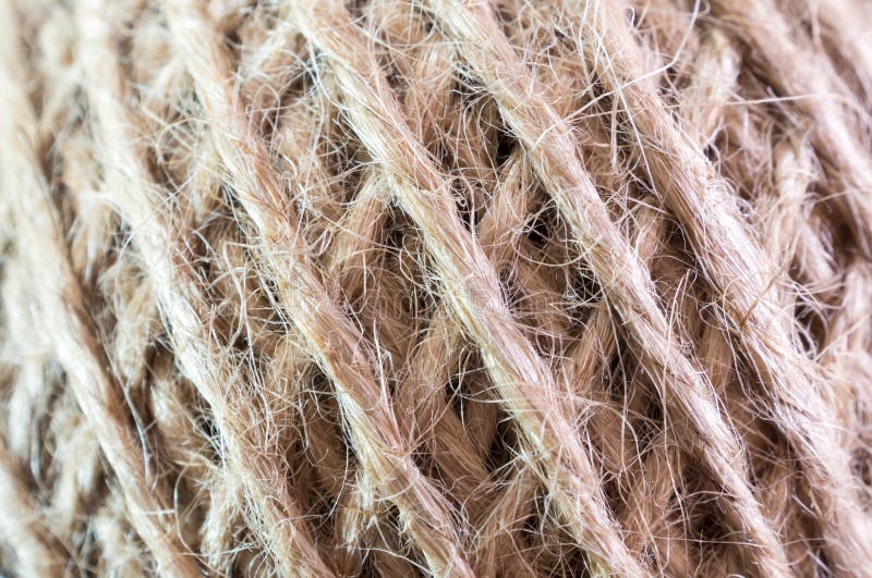Textura do cabo rústico natural marrom do cânhamo no rolo imagens de stock Textura do cabo rústico natural marrom do cânhamo no rolo imagens de stock