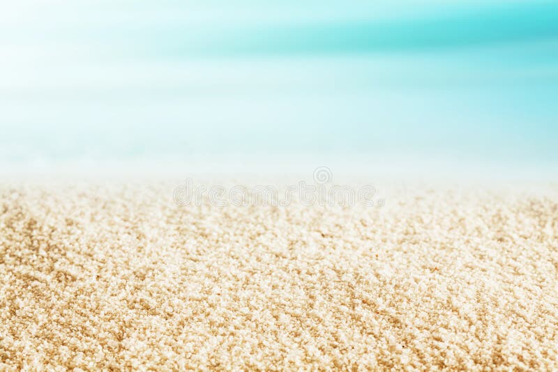 Textura dourada da areia da praia em uma praia tropical imagem de stock Textura dourada da areia da praia em uma praia tropical imagem de stock