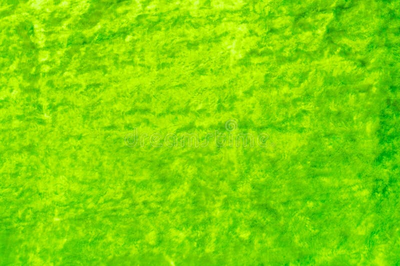 Textura, fundo, padrão. O tecido é verde veludo. Micro imagens de stock royalty free