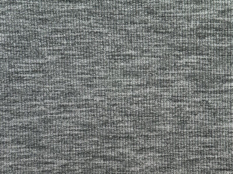 Textura gris de la tela de los géneros de punto del brezo fotos de archivo Textura gris de la tela de los géneros de punto del brezo fotos de archivo