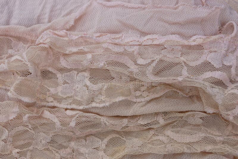 Textura ligera de un pedazo de cortinas del paño foto de archivo libre de regalías Textura ligera de un pedazo de cortinas del paño foto de archivo libre de regalías