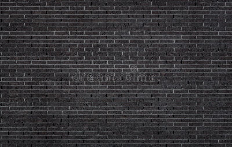Textura negra de la pared de ladrillo