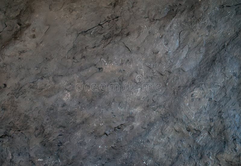Textura o fondo natural gris oscuro de la piedra de la pizarra fotografía de archivo libre de regalías Textura o fondo natural gris oscuro de la piedra de la pizarra fotografía de archivo libre de regalías