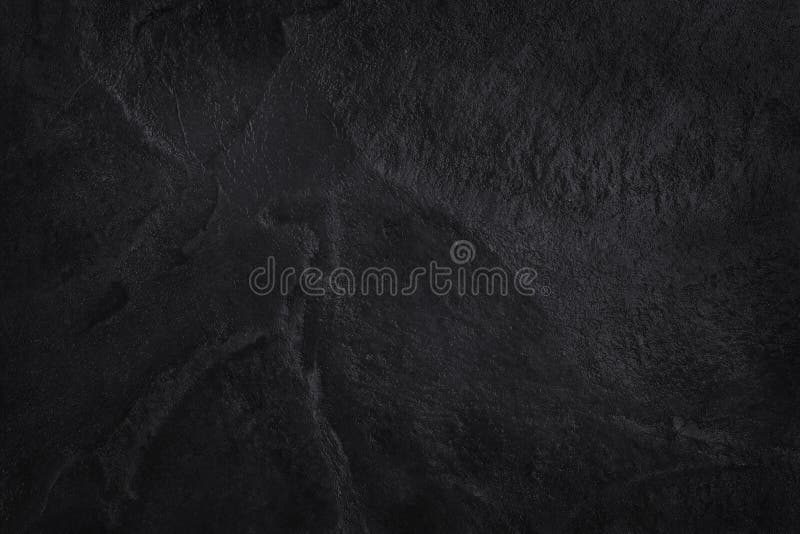 Textura preta cinzenta escura da ardósia no teste padrão natural Parede de pedra preta fotos de stock Textura preta cinzenta escura da ardósia no teste padrão natural Parede de pedra preta fotos de stock