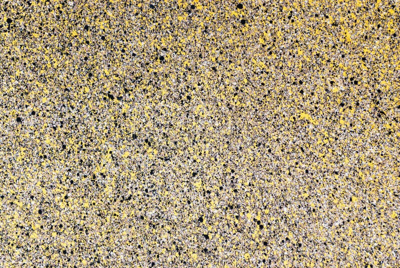 Textura ruidosa amarela e preta do fundo do muro de cimento fotografia de stock royalty free Textura ruidosa amarela e preta do fundo do muro de cimento fotografia de stock royalty free