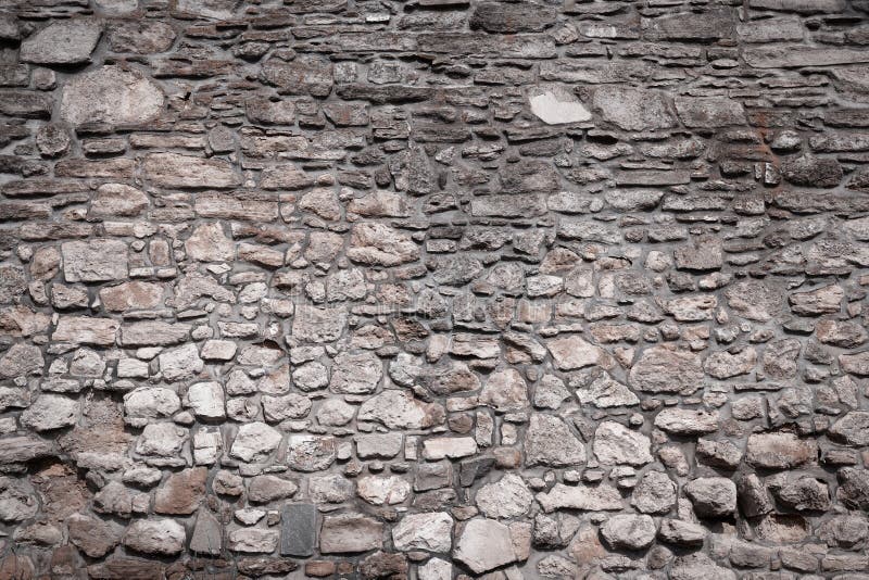 Textura velha da parede de pedra do castelo