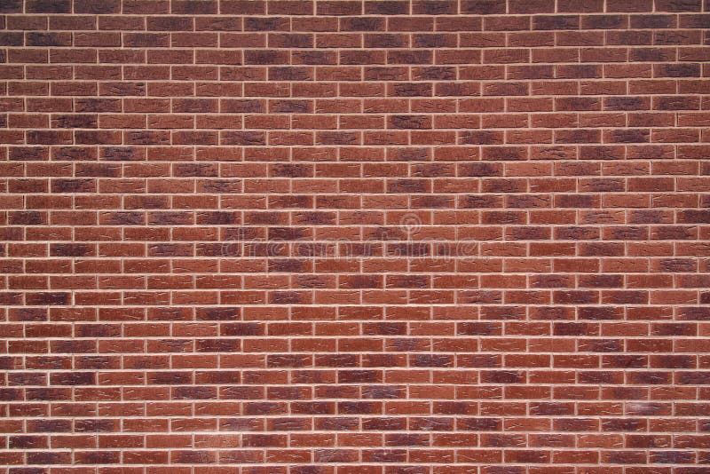 Textura vermelha exposta da parede de tijolo do vintage