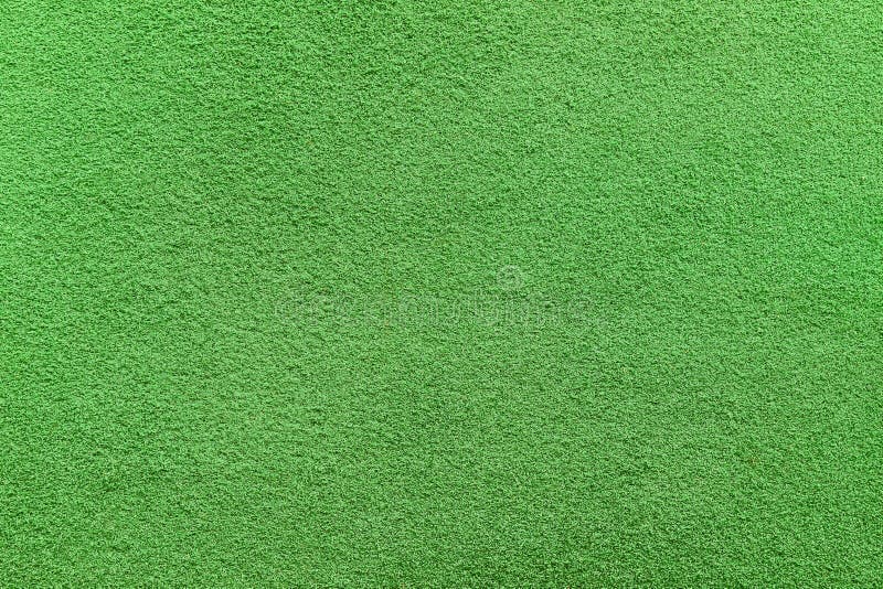 Closeup texture of artificial Putting green grass. Abstract background photo of golf turf.