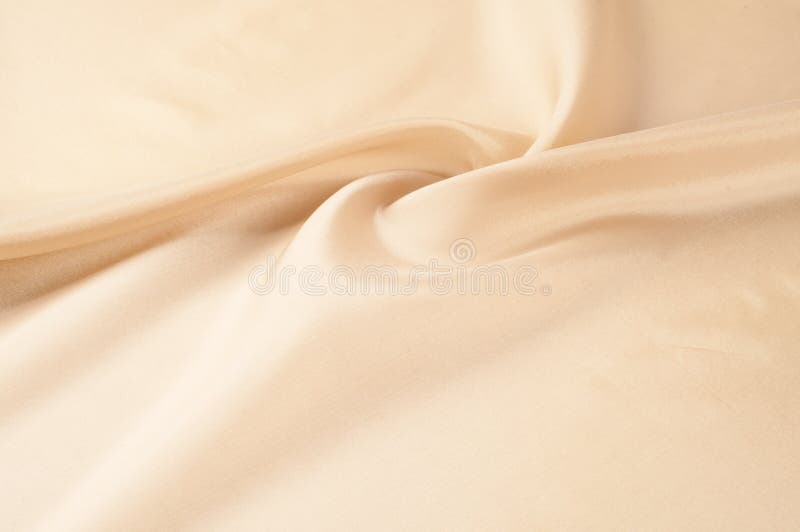 Texture background of fabric. Beige fabric. Silk fabric wallpaper texture background pattern in sepia pastel yellow cream beige t