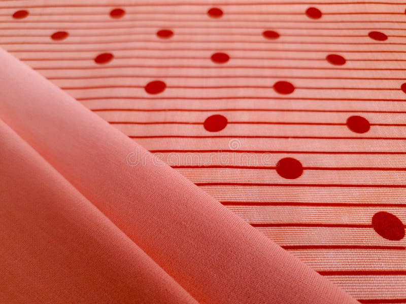 Texture, background, pattern, Beige or orange cotton with reddish dots is combined with soft peach color cotton. This fabric can royalty free stock photos Texture, background, pattern, Beige or orange cotton with reddish dots is combined with soft peach color cotton. This fabric can royalty free stock photos