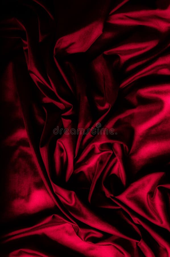 Texture, background, pattern. Dark red silk fabric. Silk satin F royalty free stock image
