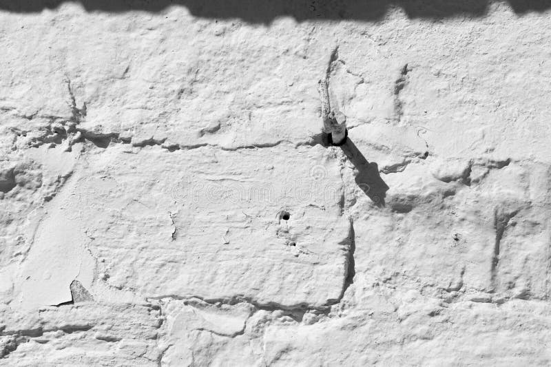 Texture background, pattern. The wall is lined with granite stones and whitewashed with lime. a continuous vertical brick or stone stock photography Texture background, pattern. The wall is lined with granite stones and whitewashed with lime. a continuous vertical brick or stone stock photography