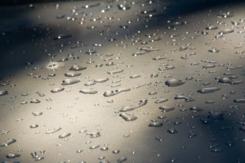 Texture background. raindrops on paintwork. Precipitation in the