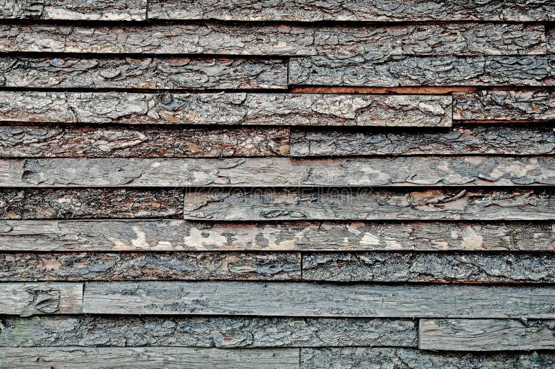 The textures of the background of wooden planks. Side view. Close-up. The textures of the background of wooden planks. Side view. Close-up.