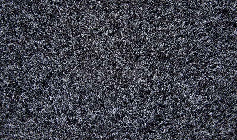 Texture of a black carpet. Background of wool. royalty free stock photo Texture of a black carpet. Background of wool. royalty free stock photo