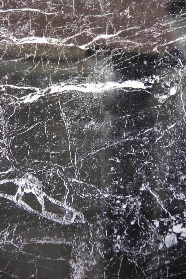 Texture of Black a Marble or Tile with White Stains and Patterns Stock