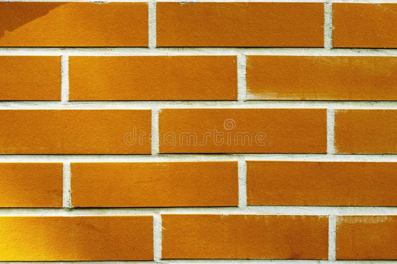 The Texture is a Brick Wall. Light Beautiful Bricklaying Stock Photo