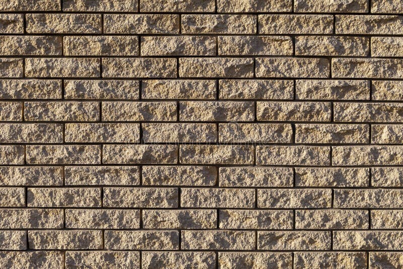 Texture of a Brick Wall Sand Color Close Up. Stock Photo - Image of