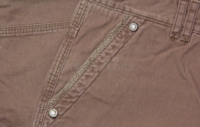 Texture of brown light jeans pocket with different direction of stitching stock photos